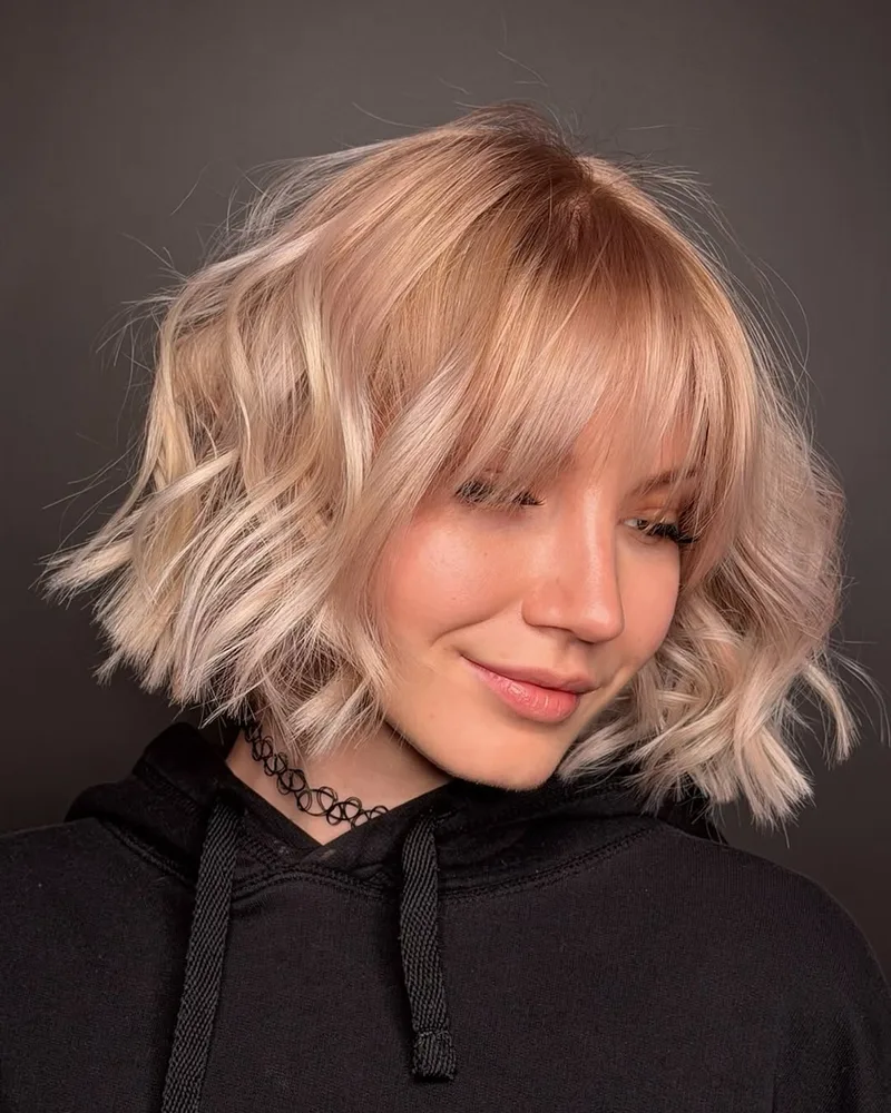Haircut blonde bob with bangs — stylist Nadzeya Vilnius