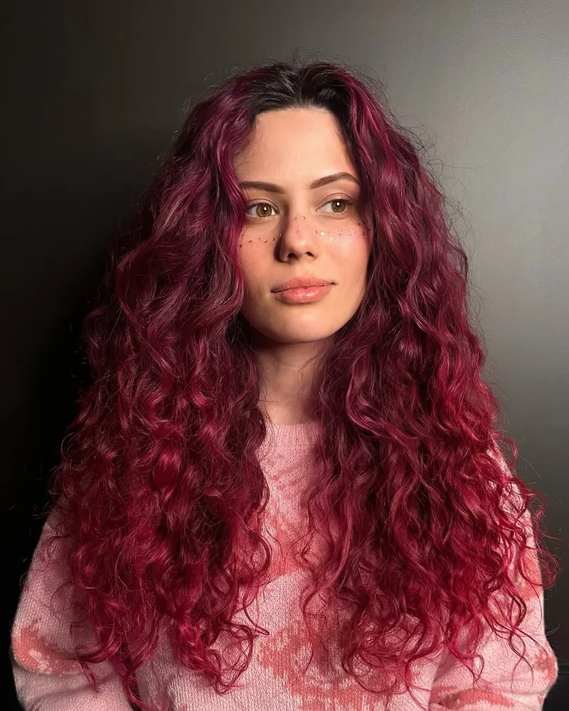 Vivid red curly hair coloring — Nadzeya colorist Vilnius